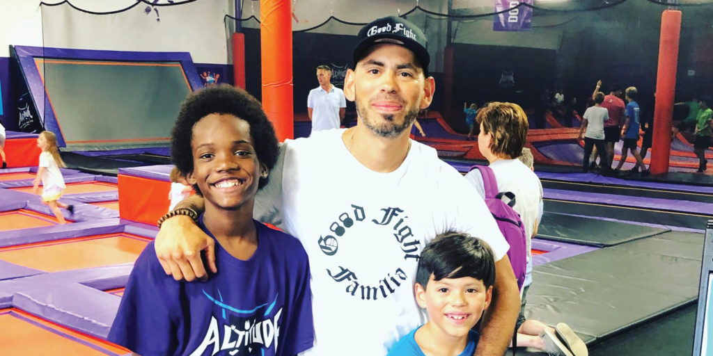 Javion, Greg, and Isaiah hanging out at the trampoline park.